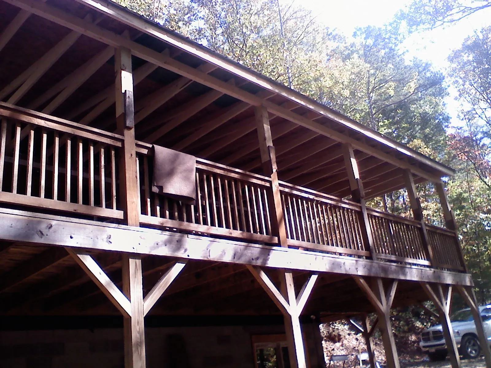 Timber framing under a new elevated porch and deck — Roof Leak Repair in Anamosa by Roofing Brothers